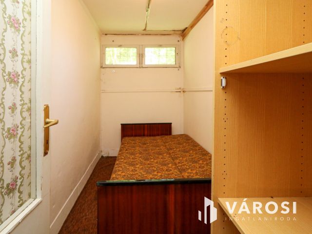 2219 nm-es fejlesztési telek nyaralóval Balatonfenyvesen